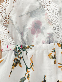 <tc>Poletni pajac s cvetličnim potiskom Araminta bel</tc>